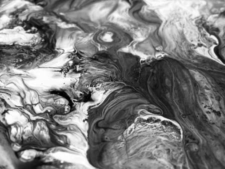 Close Up Black and White Colors Fluid Pouring Abstract Art Acrylic Painting Texture Backgroundの写真素材