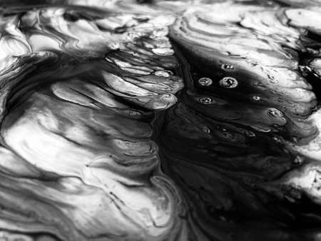 Close Up Black and White Colors Fluid Pouring Abstract Art Acrylic Painting Texture Backgroundの写真素材