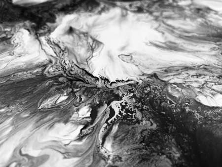Close Up Black and White Colors Fluid Pouring Abstract Art Acrylic Painting Texture Backgroundの写真素材