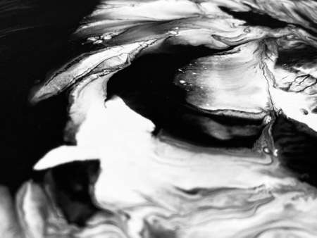 Close Up Black and White Colors Fluid Pouring Abstract Art Acrylic Painting Texture Backgroundの写真素材