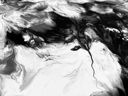 Close Up Black and White Colors Fluid Pouring Abstract Art Acrylic Painting Texture Backgroundの写真素材
