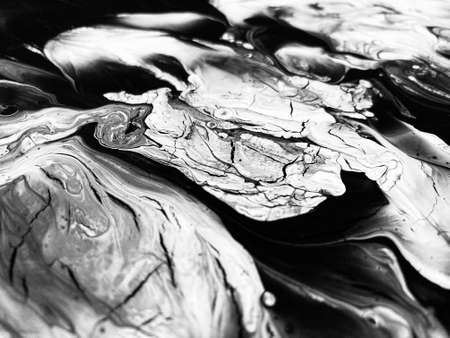 Close Up Black and White Colors Fluid Pouring Abstract Art Acrylic Painting Texture Backgroundの写真素材