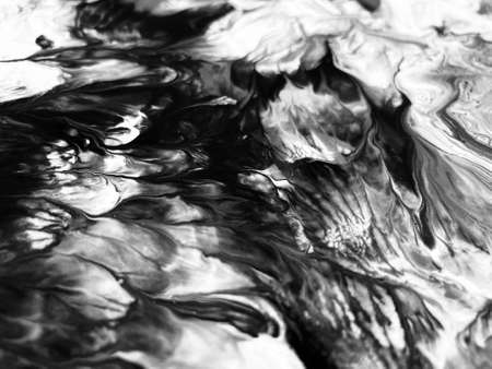 Close Up Black and White Colors Fluid Pouring Abstract Art Acrylic Painting Texture Backgroundの写真素材