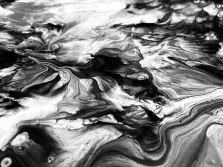 Close Up Black and White Colors Fluid Pouring Abstract Art Acrylic Painting Texture Backgroundの写真素材