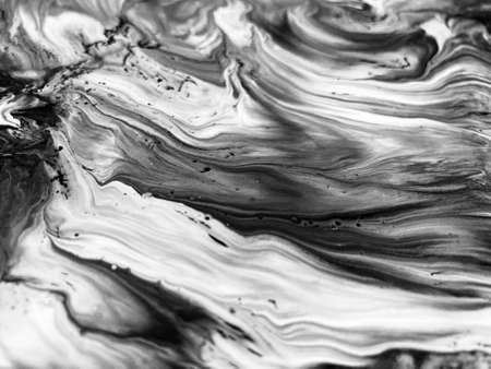 Close Up Black and White Colors Fluid Pouring Abstract Art Acrylic Painting Texture Backgroundの写真素材