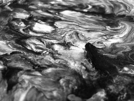 Close Up Black and White Colors Fluid Pouring Abstract Art Acrylic Painting Texture Backgroundの写真素材