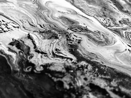Close Up Black and White Colors Fluid Pouring Abstract Art Acrylic Painting Texture Backgroundの写真素材