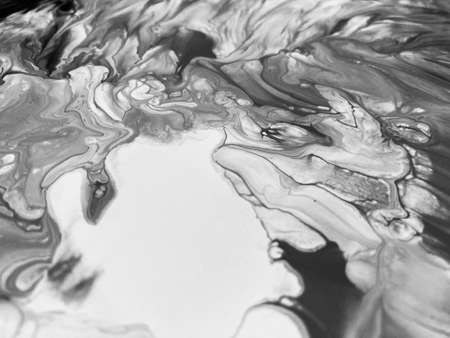 Close Up Black and White Colors Fluid Pouring Abstract Art Acrylic Painting Texture Backgroundの写真素材