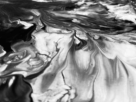 Close Up Black and White Colors Fluid Pouring Abstract Art Acrylic Painting Texture Backgroundの写真素材