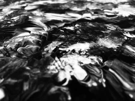 Close Up Black and White Colors Fluid Pouring Abstract Art Acrylic Painting Texture Backgroundの写真素材