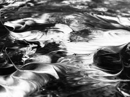 Close Up Black and White Colors Fluid Pouring Abstract Art Acrylic Painting Texture Backgroundの写真素材
