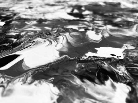 Close Up Black and White Colors Fluid Pouring Abstract Art Acrylic Painting Texture Backgroundの写真素材