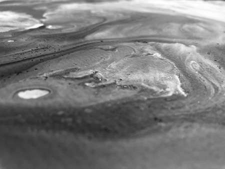 Close Up Black and White Colors Fluid Pouring Abstract Art Acrylic Painting Texture Backgroundの写真素材