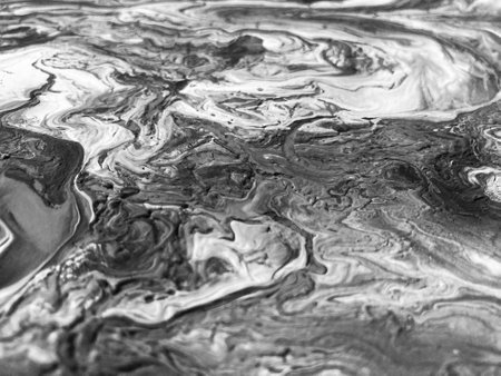 Close Up Black and White Colors Fluid Pouring Abstract Art Acrylic Painting Texture Backgroundの写真素材