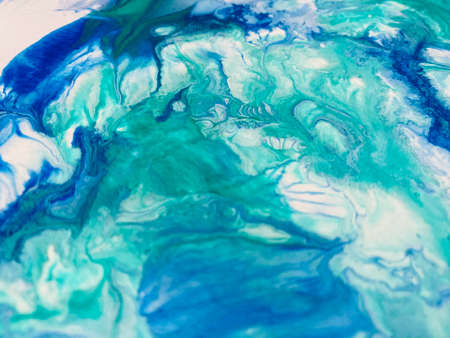 Close Up Colorful White Blue Green Colors Fluid Pouring Abstract Art Acrylic Painting Texture Backgroundの写真素材