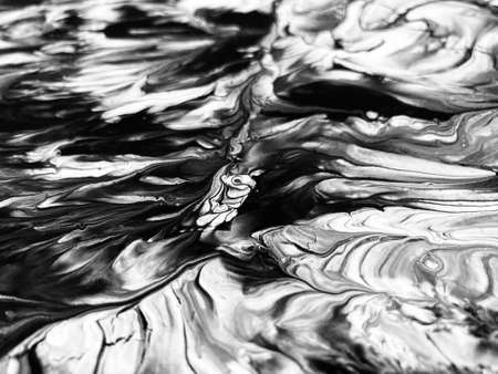 Close Up Black and White Colors Fluid Pouring Abstract Art Acrylic Painting Texture Backgroundの写真素材