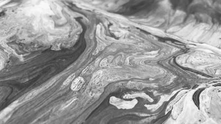 Close Up Black and White Colors Fluid Pouring Abstract Art Acrylic Painting Texture Backgroundの写真素材