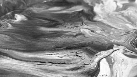 Close Up Black and White Colors Fluid Pouring Abstract Art Acrylic Painting Texture Backgroundの写真素材