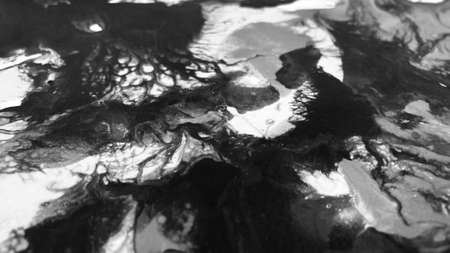 Close Up Black and White Colors Fluid Pouring Abstract Art Acrylic Painting Texture Backgroundの写真素材