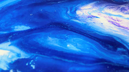 Close Up Colorful Blue Purple White Colors Fluid Pouring Abstract Art Acrylic Painting Texture Backgroundの写真素材