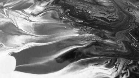 Close Up Black and White Colors Fluid Pouring Abstract Art Acrylic Painting Texture Backgroundの写真素材