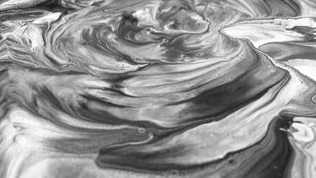 Close Up Black and White Colors Fluid Pouring Abstract Art Acrylic Painting Texture Backgroundの写真素材