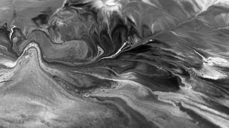 Close Up Black and White Colors Fluid Pouring Abstract Art Acrylic Painting Texture Backgroundの写真素材