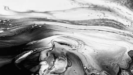 Close Up Black and White Colors Fluid Pouring Abstract Art Acrylic Painting Texture Backgroundの写真素材