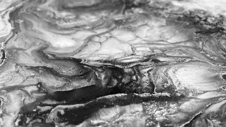 Close Up Black and White Colors Fluid Pouring Abstract Art Acrylic Painting Texture Backgroundの写真素材