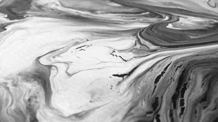 Close Up Black and White Colors Fluid Pouring Abstract Art Acrylic Painting Texture Backgroundの写真素材
