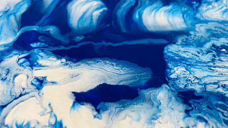 Close Up Colorful Blue and White Colors Fluid Pouring Abstract Art Acrylic Painting Texture Backgroundの写真素材