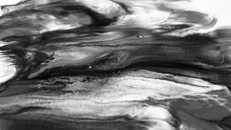 Close Up Black and White Colors Fluid Pouring Abstract Art Acrylic Painting Texture Background