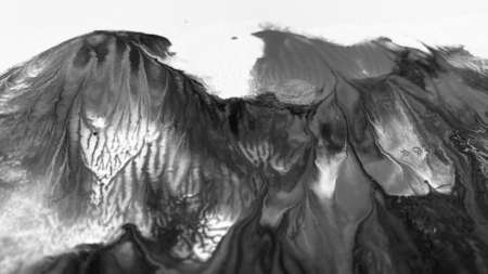 Close Up Black and White Colors Fluid Pouring Abstract Art Acrylic Painting Texture Backgroundの写真素材