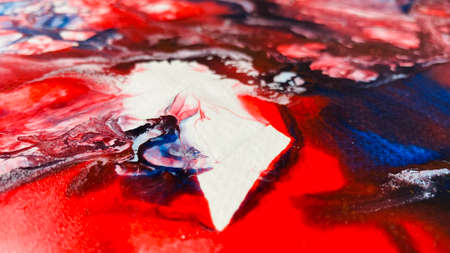 Close Up Colorful Red Blue White Colors Fluid Pouring Abstract Art Acrylic Painting Texture Backgroundの写真素材