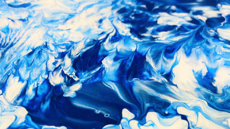 Close Up Colorful Blue and White Colors Fluid Pouring Abstract Art Acrylic Painting Texture...