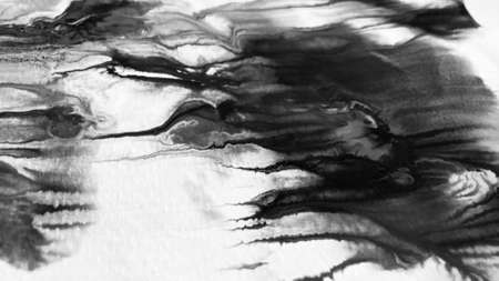 Close Up Black and White Colors Fluid Pouring Abstract Art Acrylic Painting Texture Backgroundの写真素材
