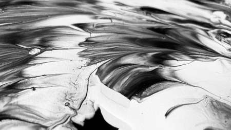 Close Up Black and White Colors Fluid Pouring Abstract Art Acrylic Painting Texture Backgroundの写真素材