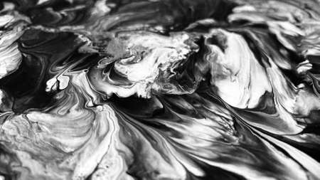 Close Up Black and White Colors Fluid Pouring Abstract Art Acrylic Painting Texture Backgroundの写真素材