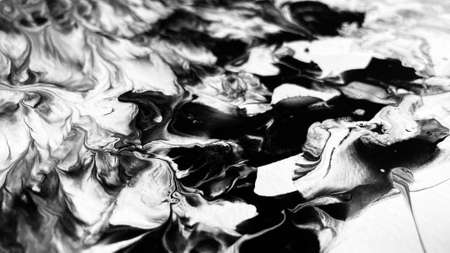 Close Up Black and White Colors Fluid Pouring Abstract Art Acrylic Painting Texture Backgroundの写真素材