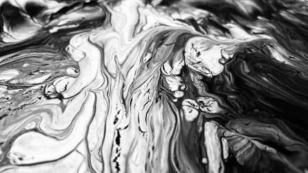 Close Up Black and White Colors Fluid Pouring Abstract Art Acrylic Painting Texture Backgroundの写真素材