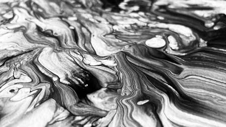 Close Up Black and White Colors Fluid Pouring Abstract Art Acrylic Painting Texture Backgroundの写真素材
