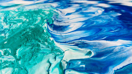 Close Up Colorful Blue Green White Colors Fluid Pouring Abstract Art Acrylic Painting Texture Backgroundの写真素材