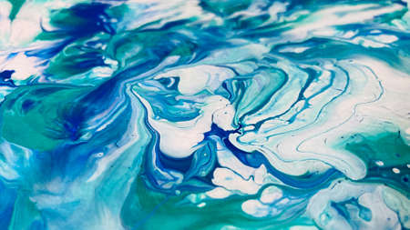Close Up Colorful Blue Green White Colors Fluid Pouring Abstract Art Acrylic Painting Texture Backgroundの写真素材