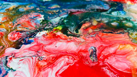 Close Up Colorful Fluid Pouring Abstract Art Acrylic Painting Texture Backgroundの写真素材