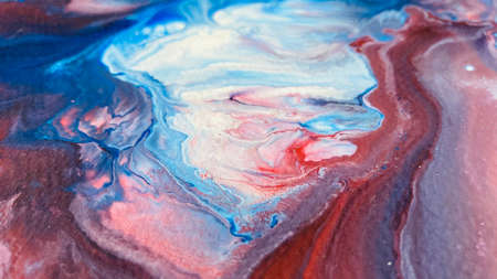 Close Up Colorful Blue Red White Colors Fluid Pouring Abstract Art Acrylic Painting Texture Backgroundの写真素材