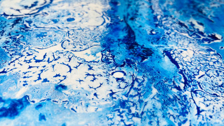 Close Up Colorful Blue and White Colors Fluid Pouring Abstract Art Acrylic Painting Texture Backgroundの写真素材