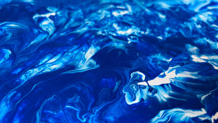 Close Up Colorful Blue and White Colors Fluid Pouring Abstract Art Acrylic Painting Texture Backgroundの写真素材