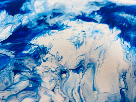 Close Up Colorful Blue and White Colos Fluid Pouring Abstract Art Acrylic Painting Texture Backgroundの写真素材