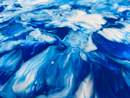 Close Up Colorful Blue and White Colos Fluid Pouring Abstract Art Acrylic Painting Texture Backgroundの写真素材