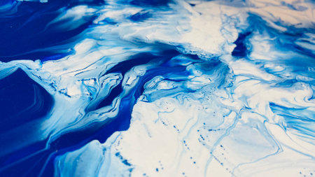 Close Up Colorful Blue and White Colos Fluid Pouring Abstract Art Acrylic Painting Texture Backgroundの写真素材
